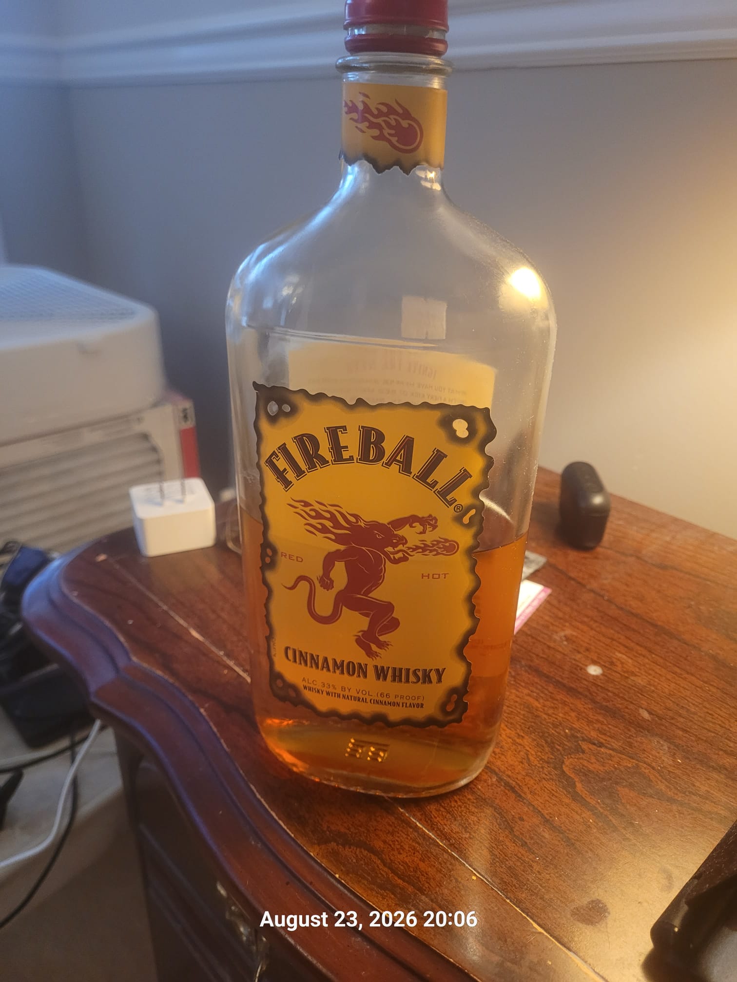 Ted Lee's partly finished bottle of Fireball cinnamon whisky, photographed on August 23, 2026